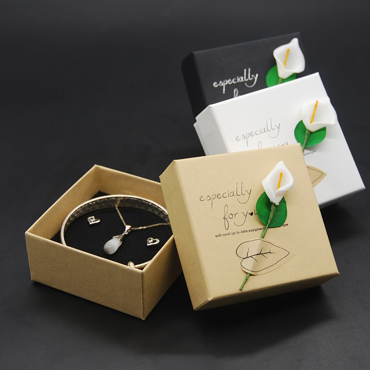 Jewelry Boxes with Floral Designs, White Faux Leather Pendant Boxes, Black Faux Leather Bracelet Boxes, And Accessory Boxes